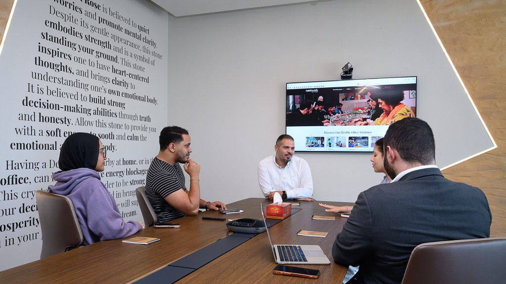 Nestwork members in a meeting
